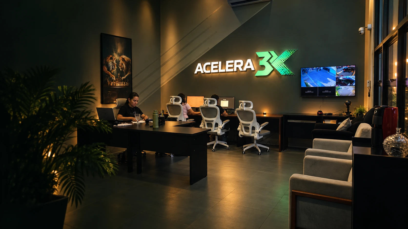Escritório da Acelera 3X em Fortaleza, com o letreiro iluminado e a equipe trabalhando